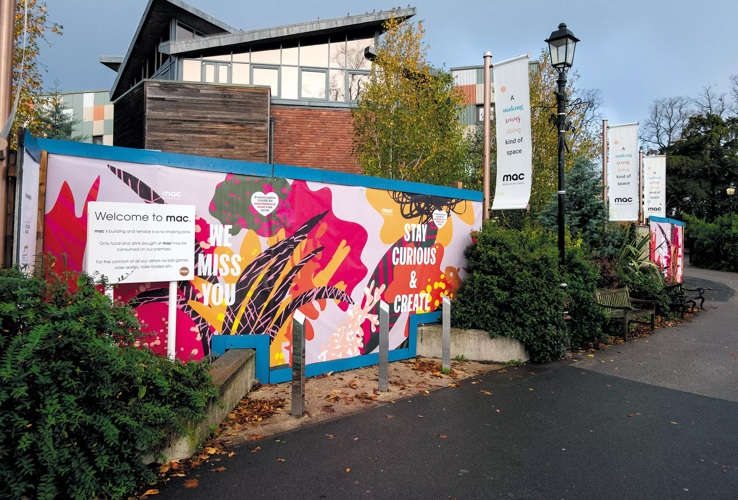 Colourful hoardings around the Midlands Arts Centre in Cannon Hill Park, Birmingham