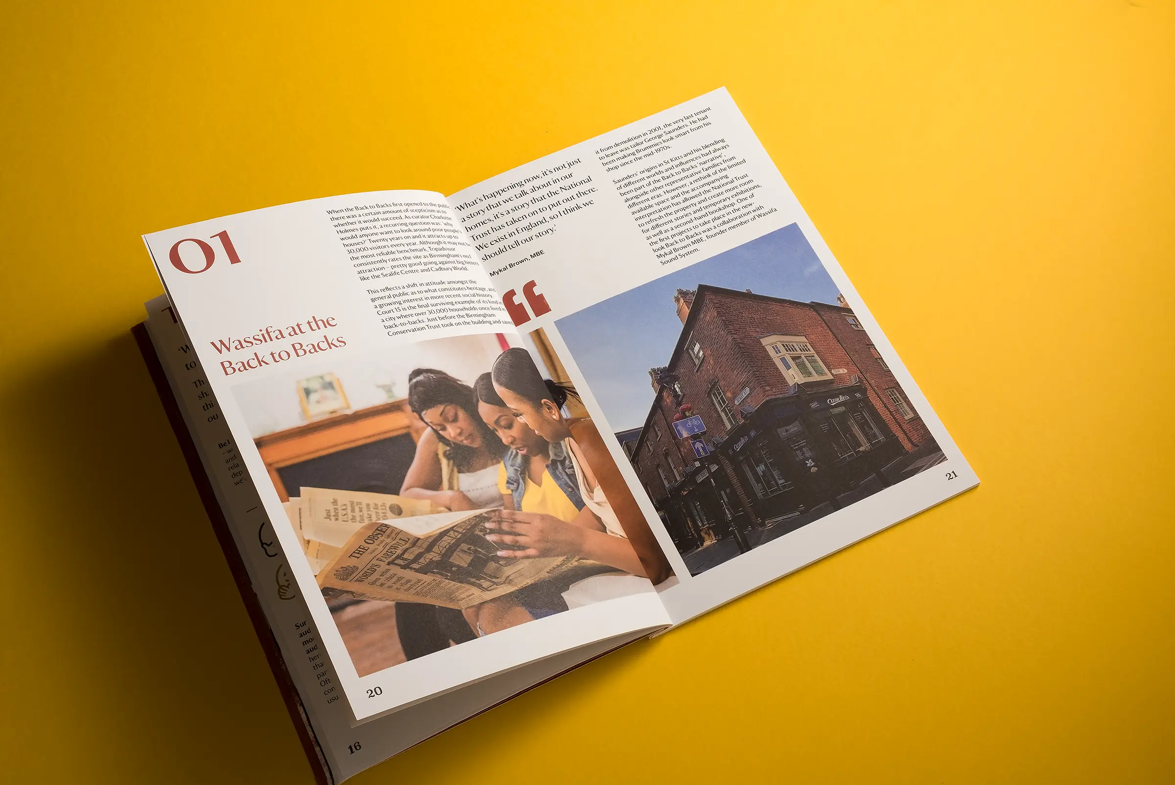 An image of a white brochure for National Trust Birmingham, lying on a bright yellow background